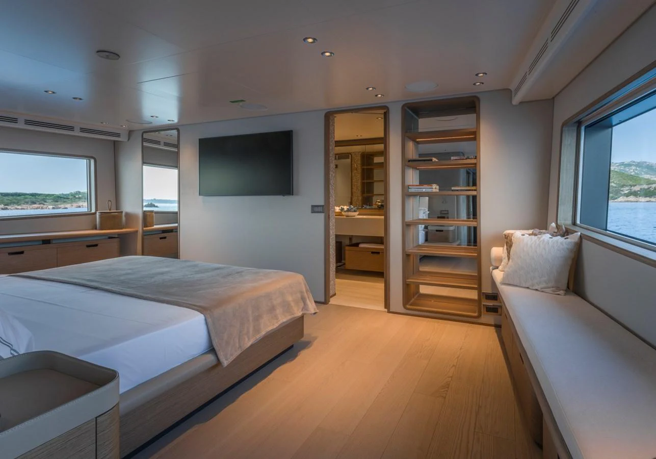 The master stateroom offers a spacious and serene retreat with large windows and modern amenities. aboard CLAIRE DE LUNE Yacht for Sale