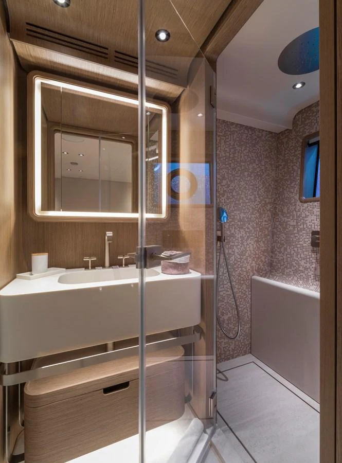 The yacht's bathroom features modern fixtures and a sleek design. aboard CLAIRE DE LUNE Yacht for Sale
