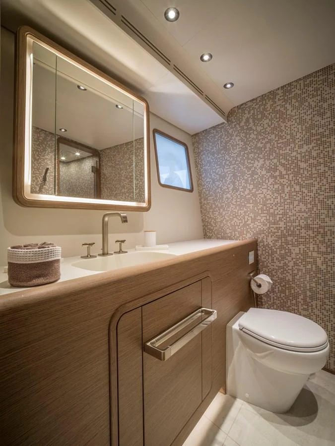 A modern yacht bathroom with elegant fixtures and a stylish design. aboard CLAIRE DE LUNE Yacht for Sale