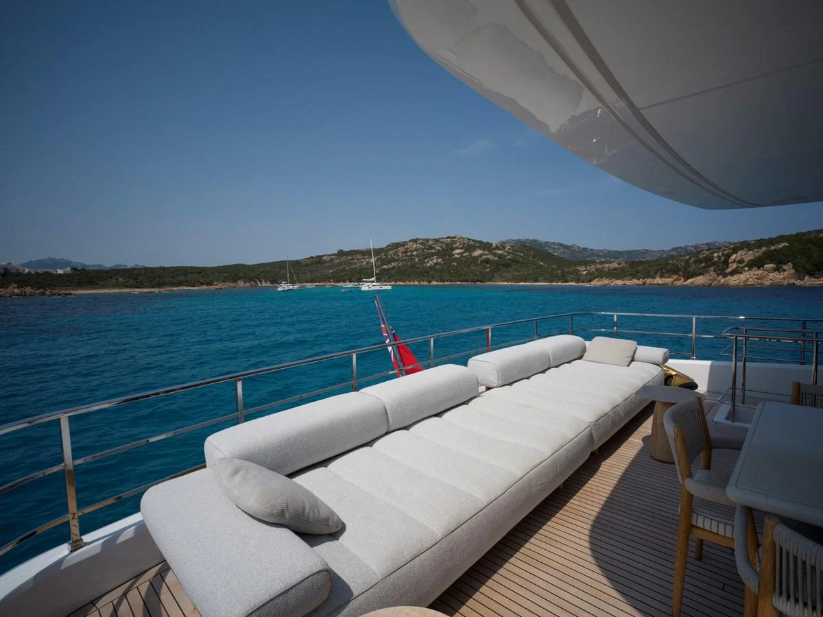 The aft deck features a spacious lounging area with plush seating, perfect for relaxation while enjoying the scenic views. aboard CLAIRE DE LUNE Yacht for Sale