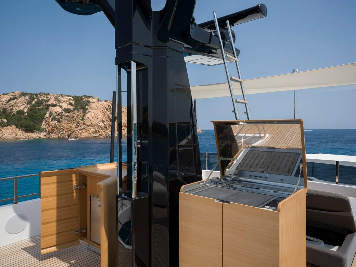 A modern grill area on the yacht's deck, perfect for outdoor dining with a stunning sea view. aboard CLAIRE DE LUNE Yacht for Sale