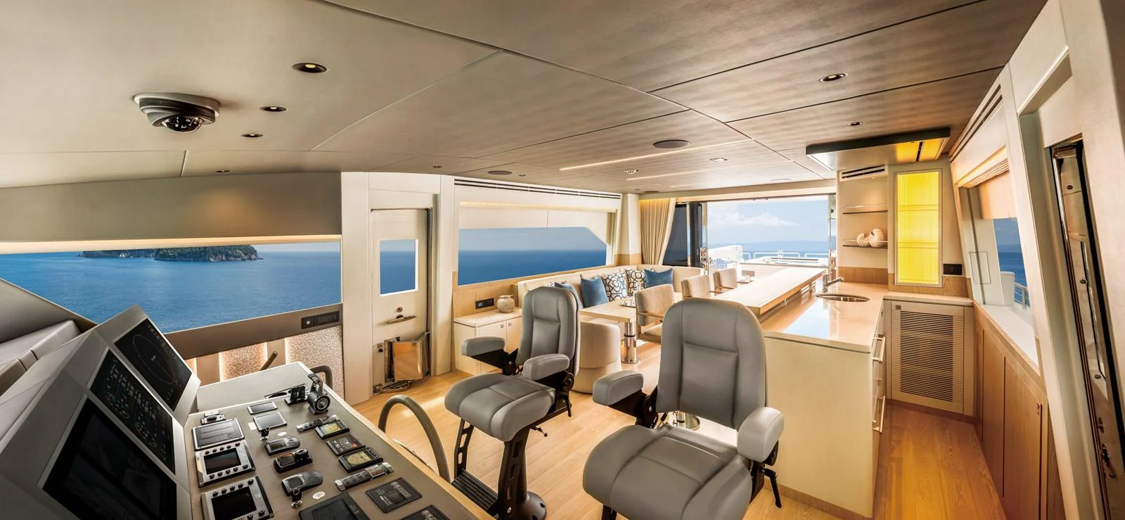 The helm area features state-of-the-art navigation equipment and luxurious seating with panoramic ocean views. aboard HORIZON FD80/19 Yacht for Sale