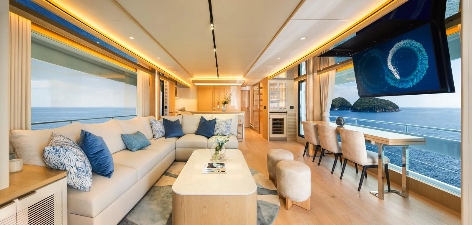 The spacious salon features luxurious seating with panoramic ocean views. aboard HORIZON FD80/19 Yacht for Sale