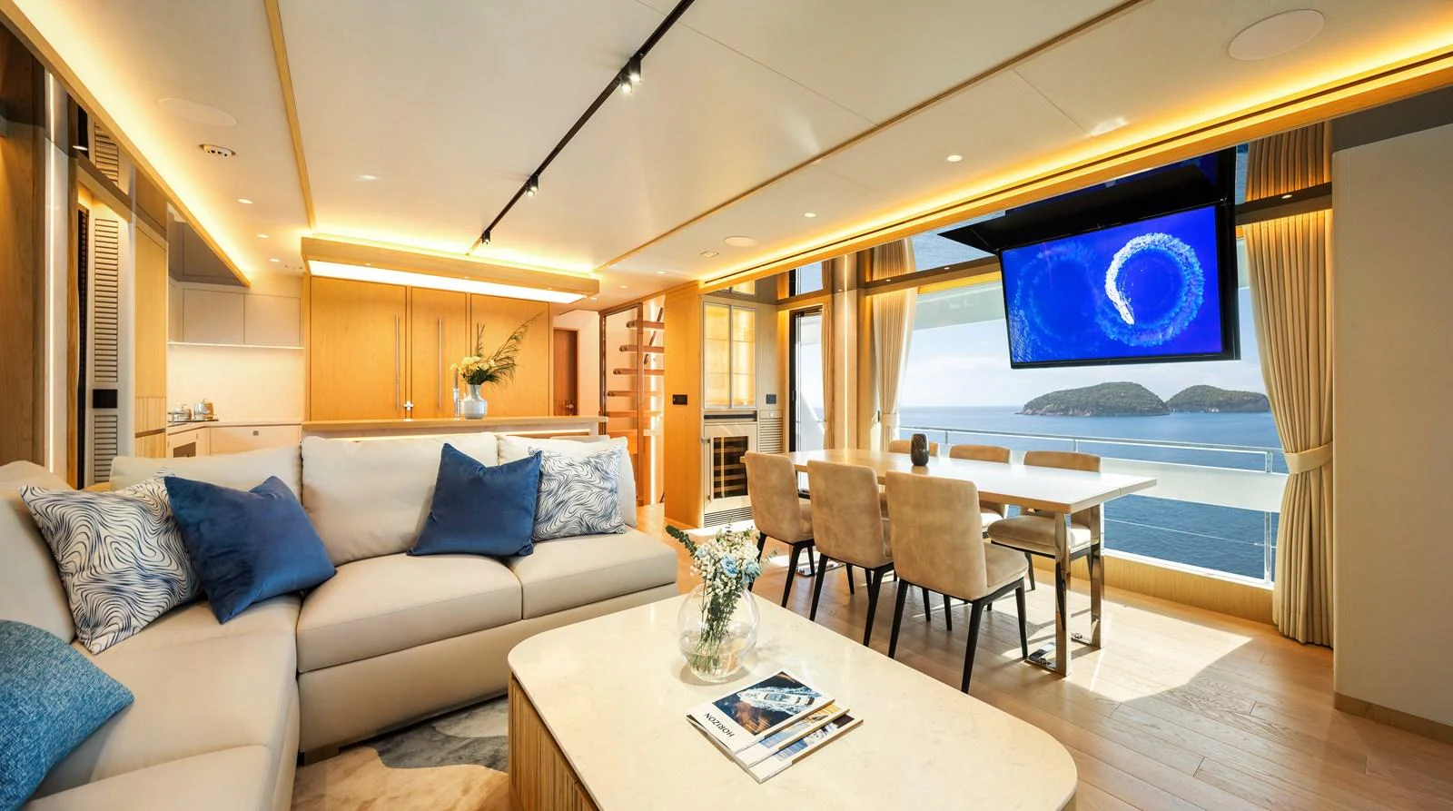 The salon offers a spacious and luxurious living area with a stunning ocean view. aboard HORIZON FD80/19 Yacht for Sale