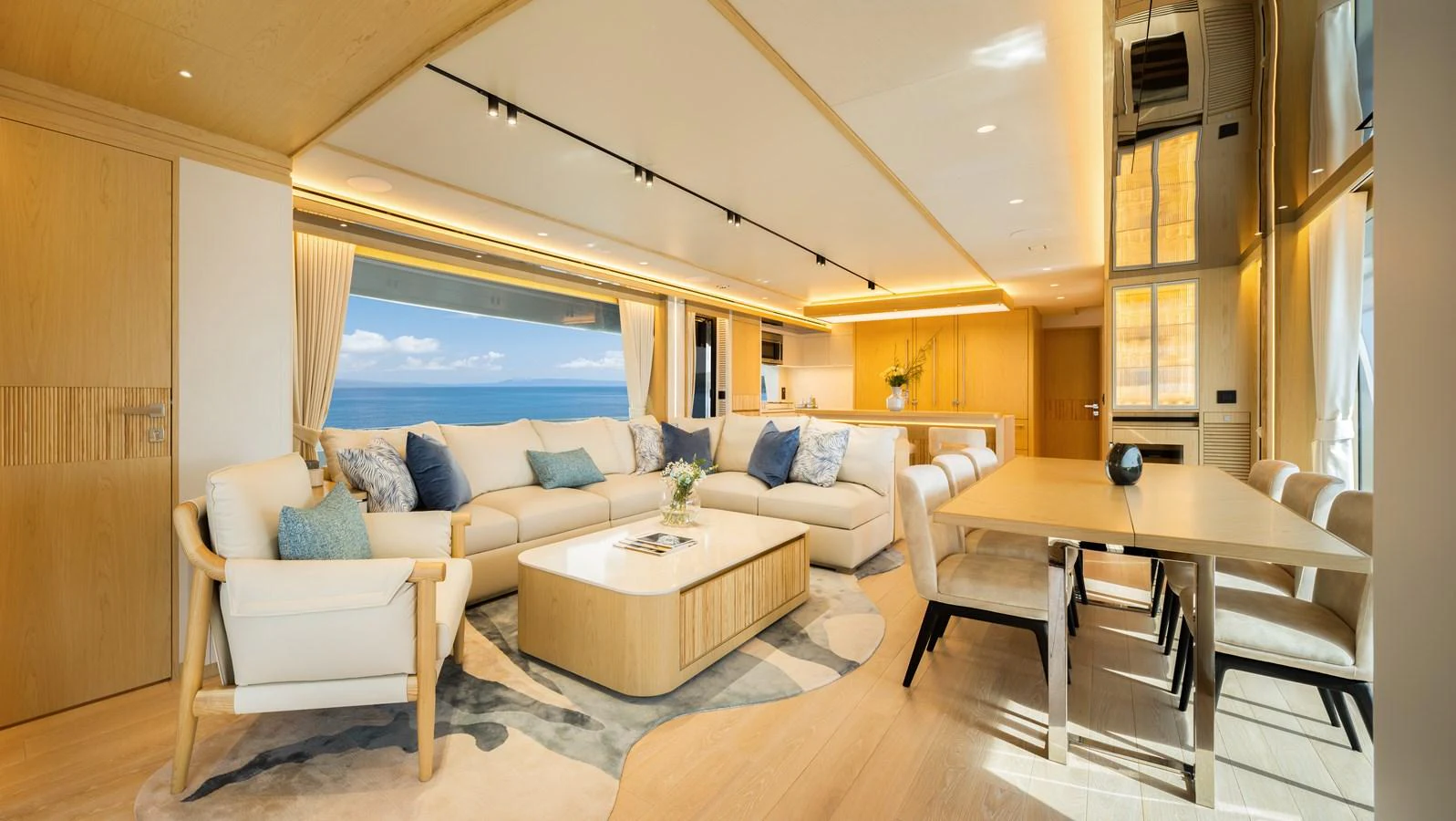 The salon features a spacious and elegantly designed seating area with panoramic ocean views. aboard HORIZON FD80/19 Yacht for Sale