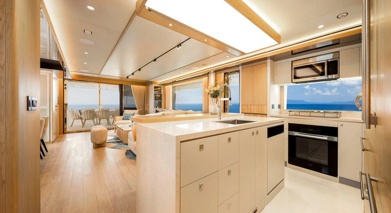 The yacht's galley features modern appliances and a spacious layout with a view of the sea. aboard HORIZON FD80/19 Yacht for Sale