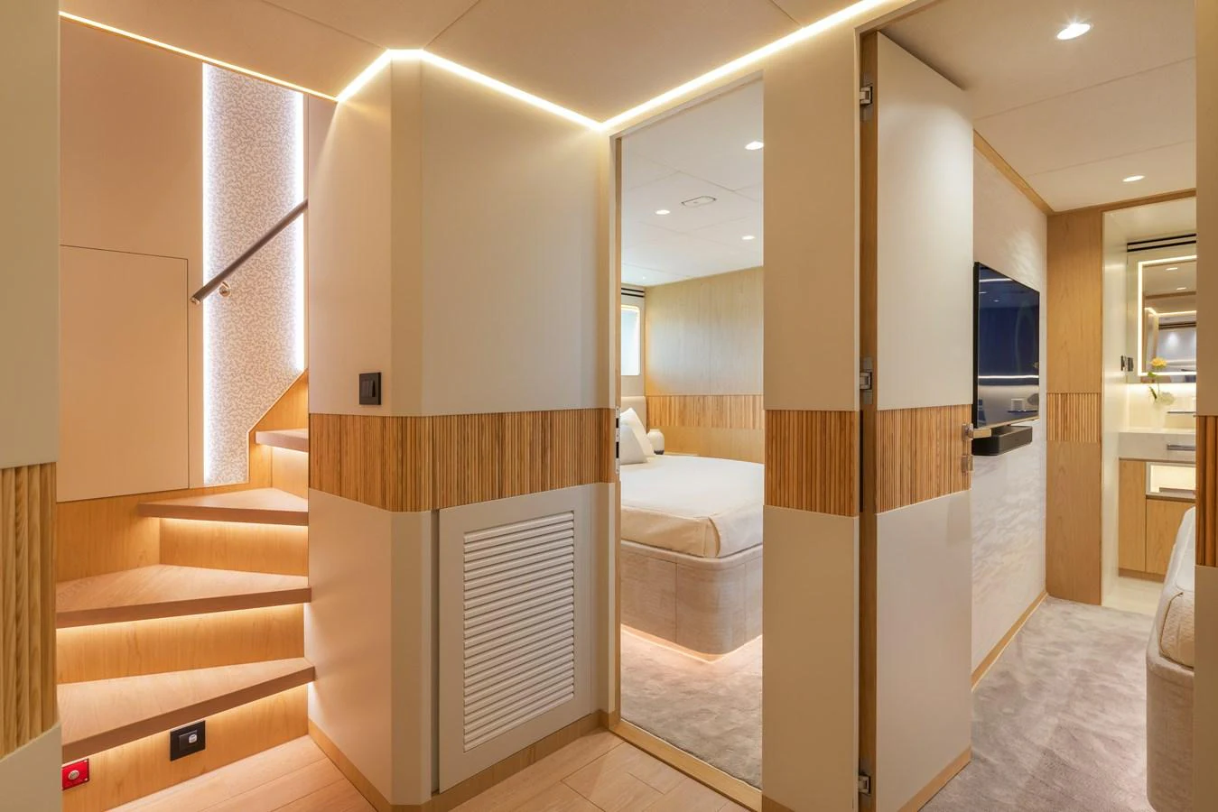 The image showcases a luxurious stateroom with modern design and ambient lighting. aboard HORIZON FD80/19 Yacht for Sale
