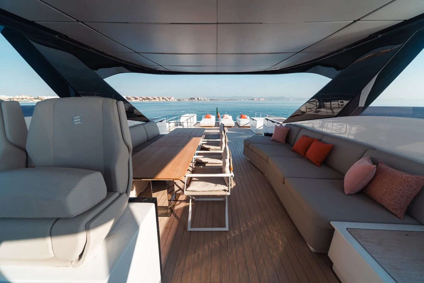 The aft deck offers a spacious and stylish seating area with a stunning view of the sea. aboard SEA SAKURA Yacht for Sale