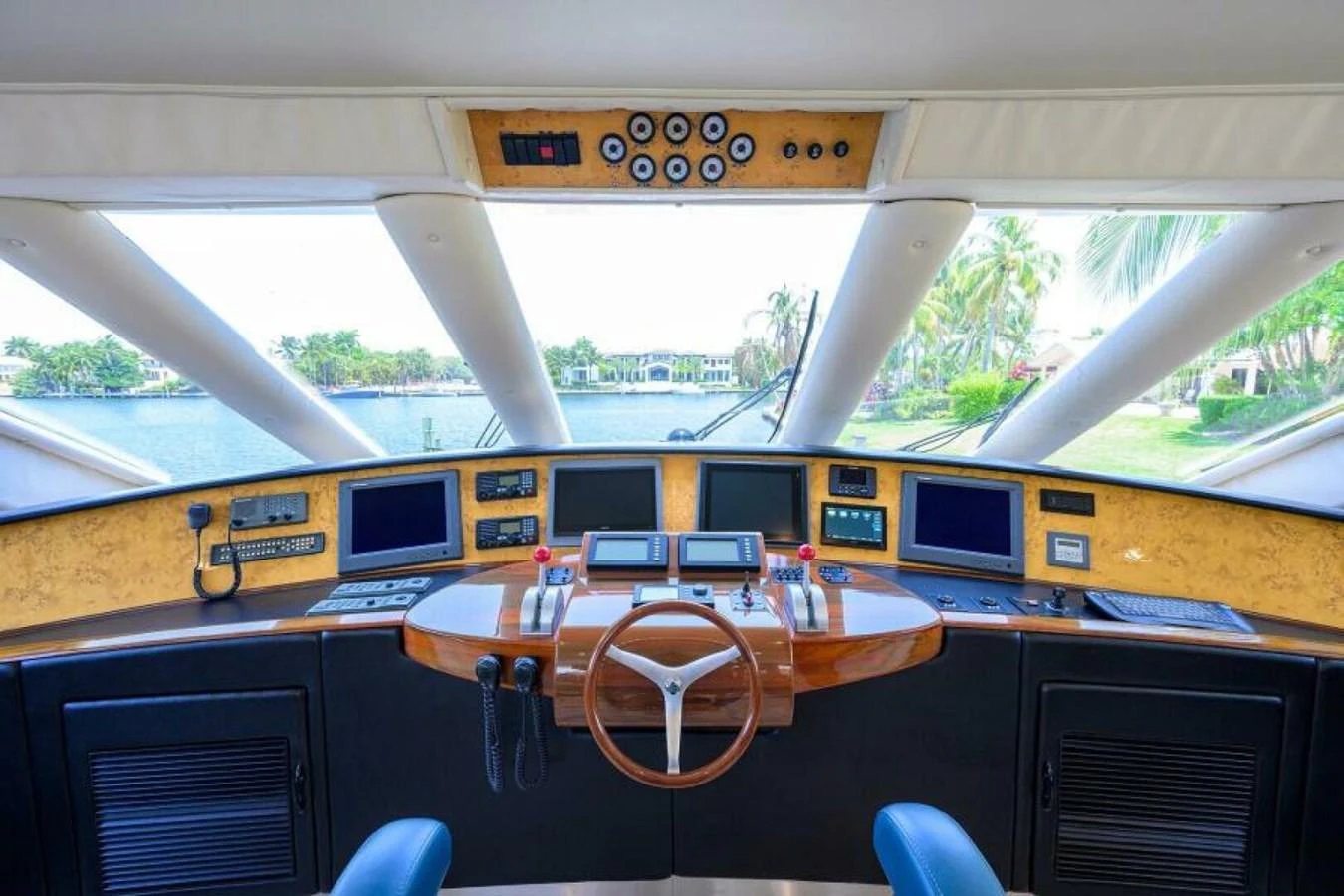 The helm station offers a commanding view with state-of-the-art navigation equipment. aboard JUNIOR Yacht for Sale