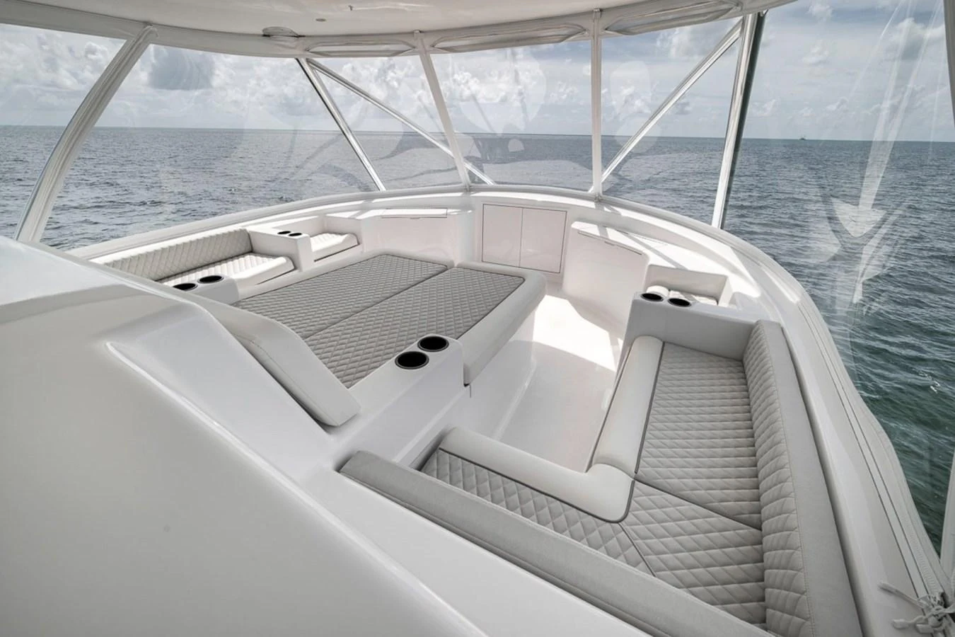 The flybridge offers a spacious and comfortable seating area with panoramic ocean views. aboard GENESIS Yacht for Sale