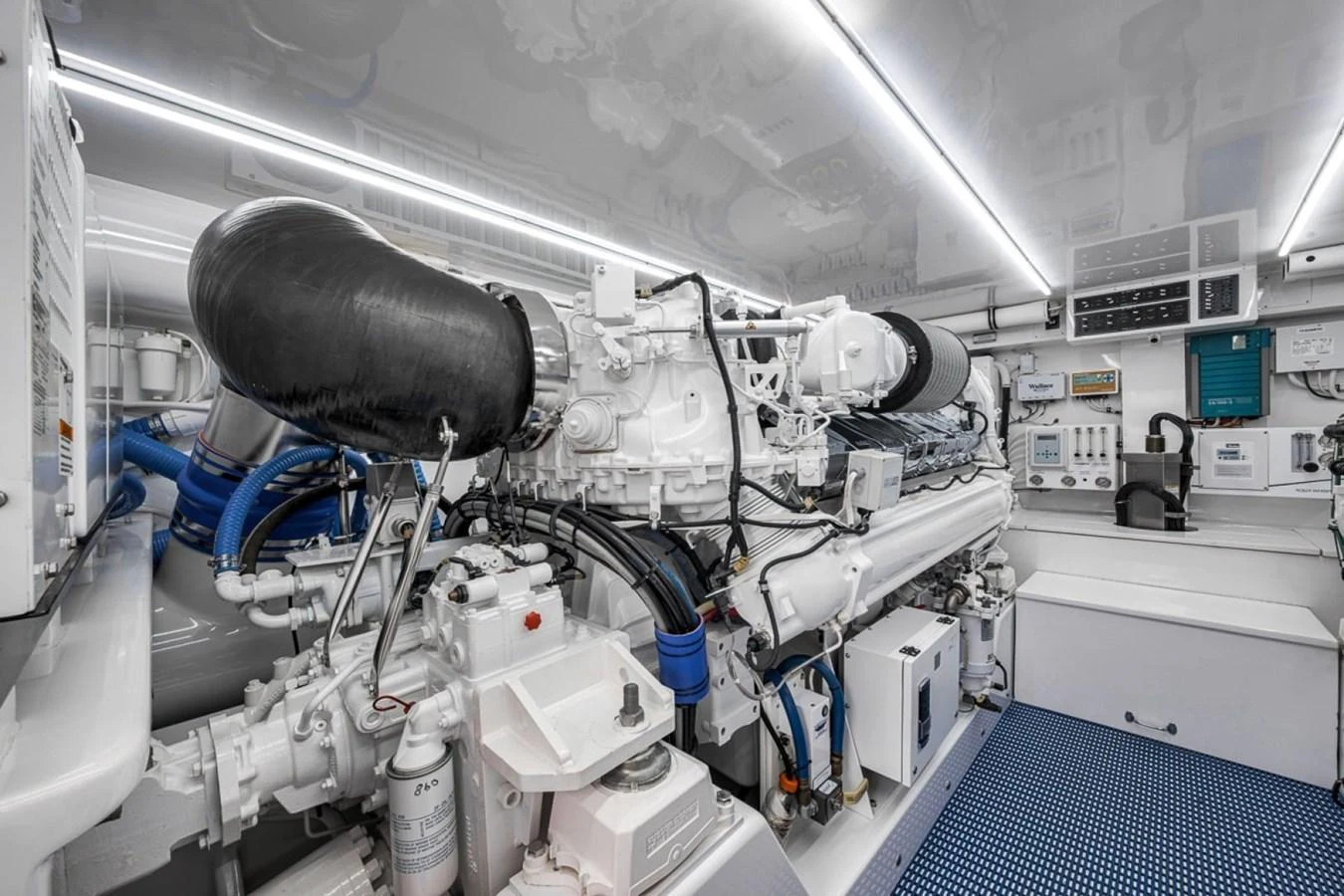 The yacht's engine room showcases advanced machinery and meticulous organization. aboard GENESIS Yacht for Sale