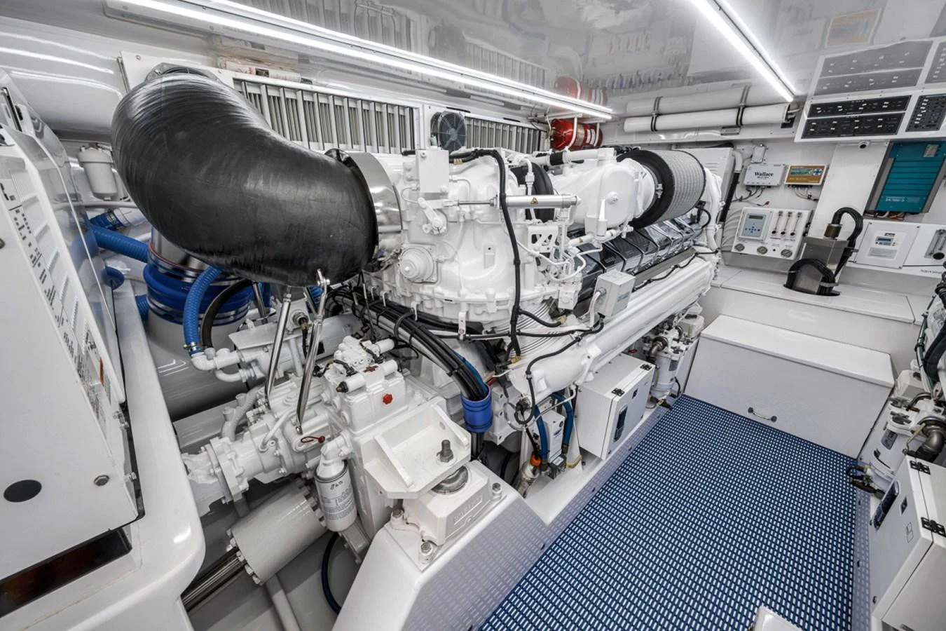 The engine room showcases powerful machinery and a pristine, organized layout. aboard GENESIS Yacht for Sale