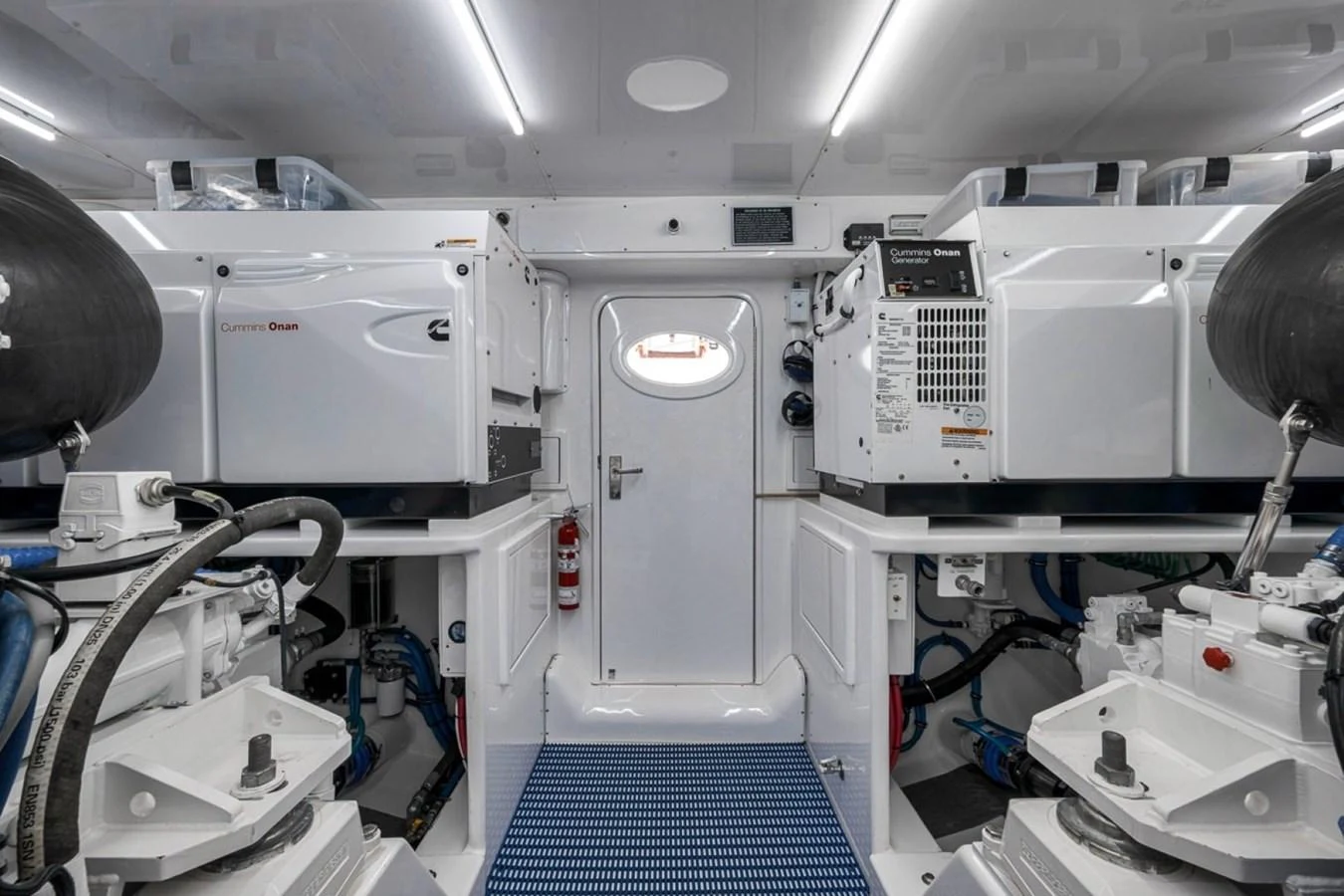 The engine room is meticulously organized with advanced machinery and equipment. aboard GENESIS Yacht for Sale