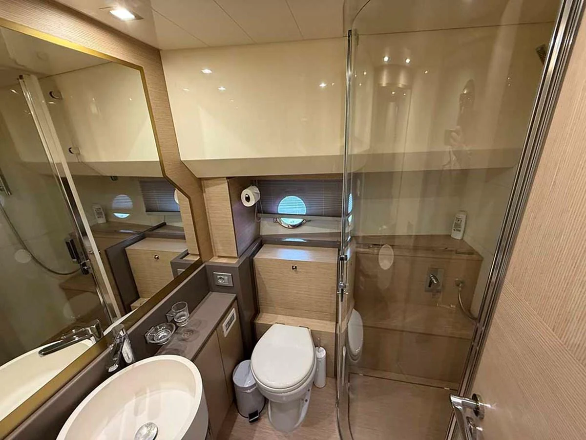 The yacht's bathroom features modern fixtures and a sleek design. aboard LA LUNA Yacht for Sale