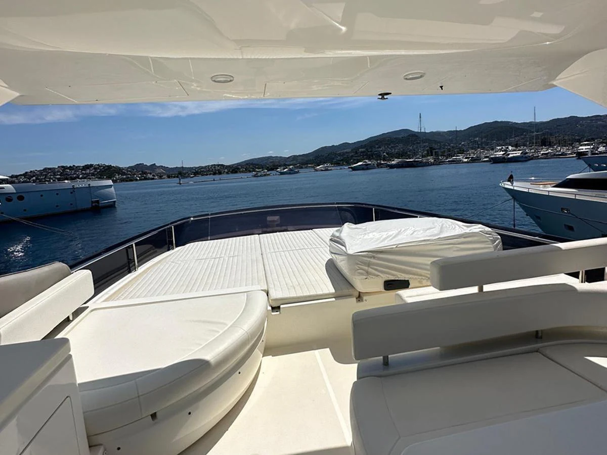 The aft deck offers a spacious and comfortable area for relaxation with stunning views of the marina. aboard LA LUNA Yacht for Sale