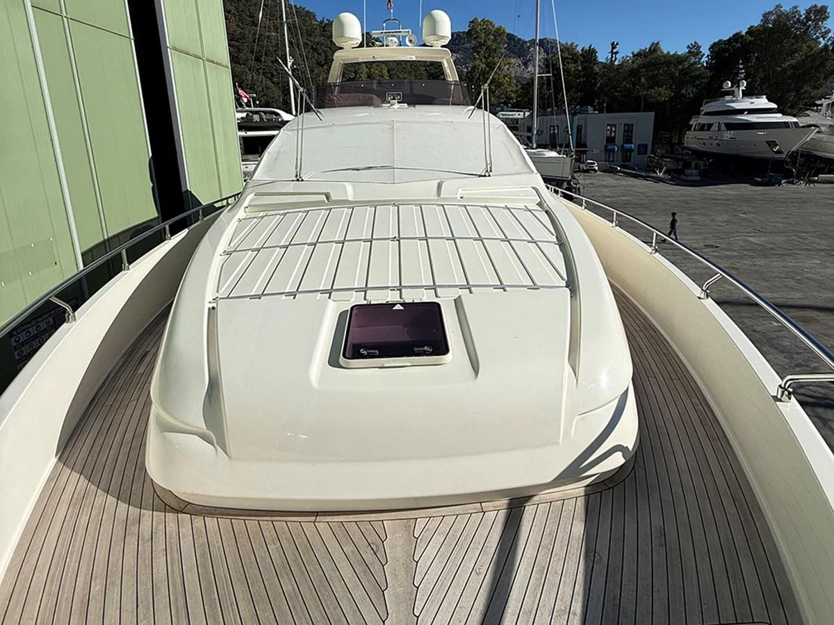 The foredeck of the yacht features a spacious sunbathing area with a sleek design. aboard LA LUNA Yacht for Sale