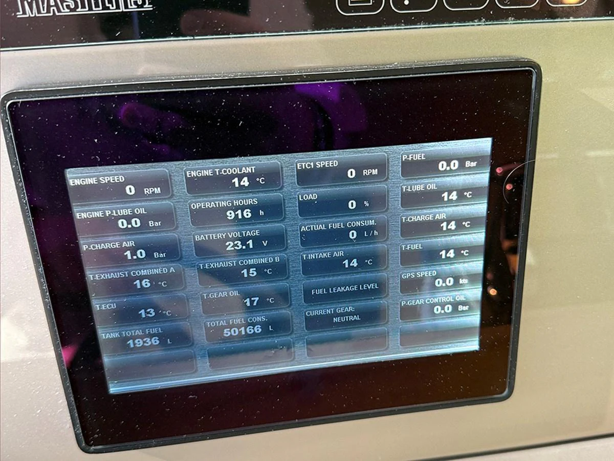 A close-up view of the yacht's control panel displaying various engine and system metrics. aboard LA LUNA Yacht for Sale