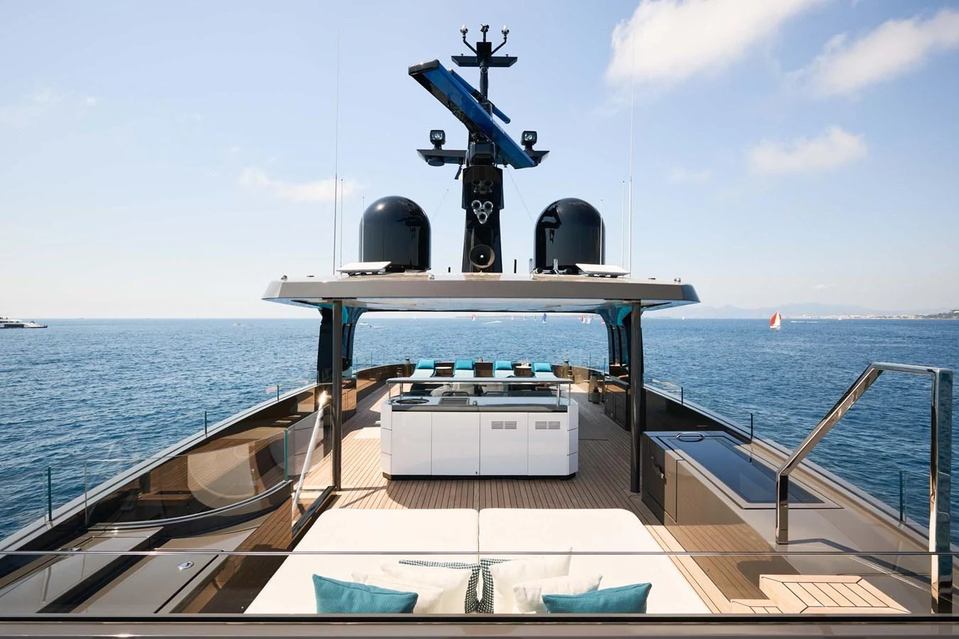 The flybridge offers a spacious and luxurious outdoor area with stunning sea views. aboard LOEWE Yacht for Sale