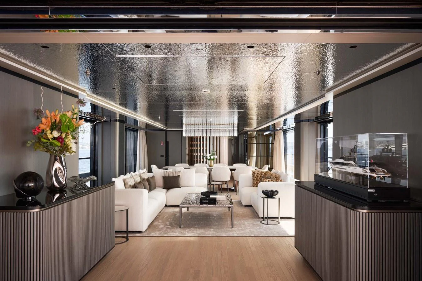 The salon offers a spacious and elegant setting with modern furnishings and luxurious decor. aboard LOEWE Yacht for Sale