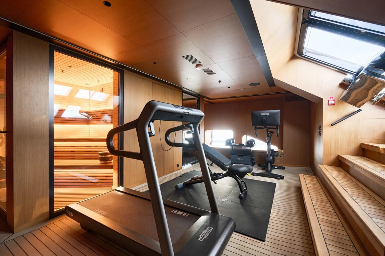 The yacht features a modern gym with state-of-the-art equipment and a sauna. aboard LOEWE Yacht for Sale