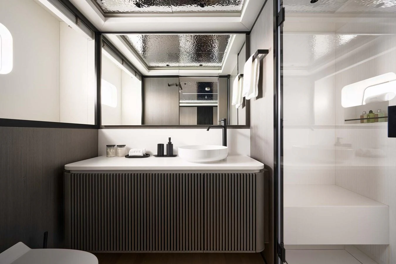 A modern and sleek bathroom with a spacious shower and elegant fixtures. aboard LOEWE Yacht for Sale