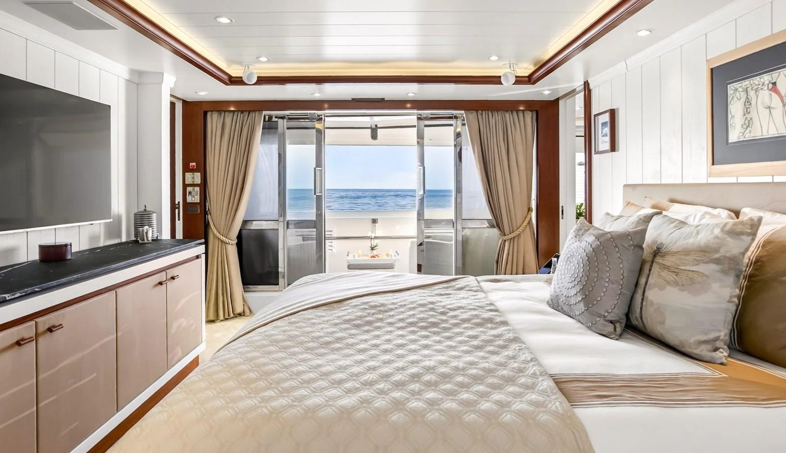 The master stateroom offers a luxurious and spacious retreat with a stunning view of the ocean. aboard LADY TRUDY Yacht for Sale