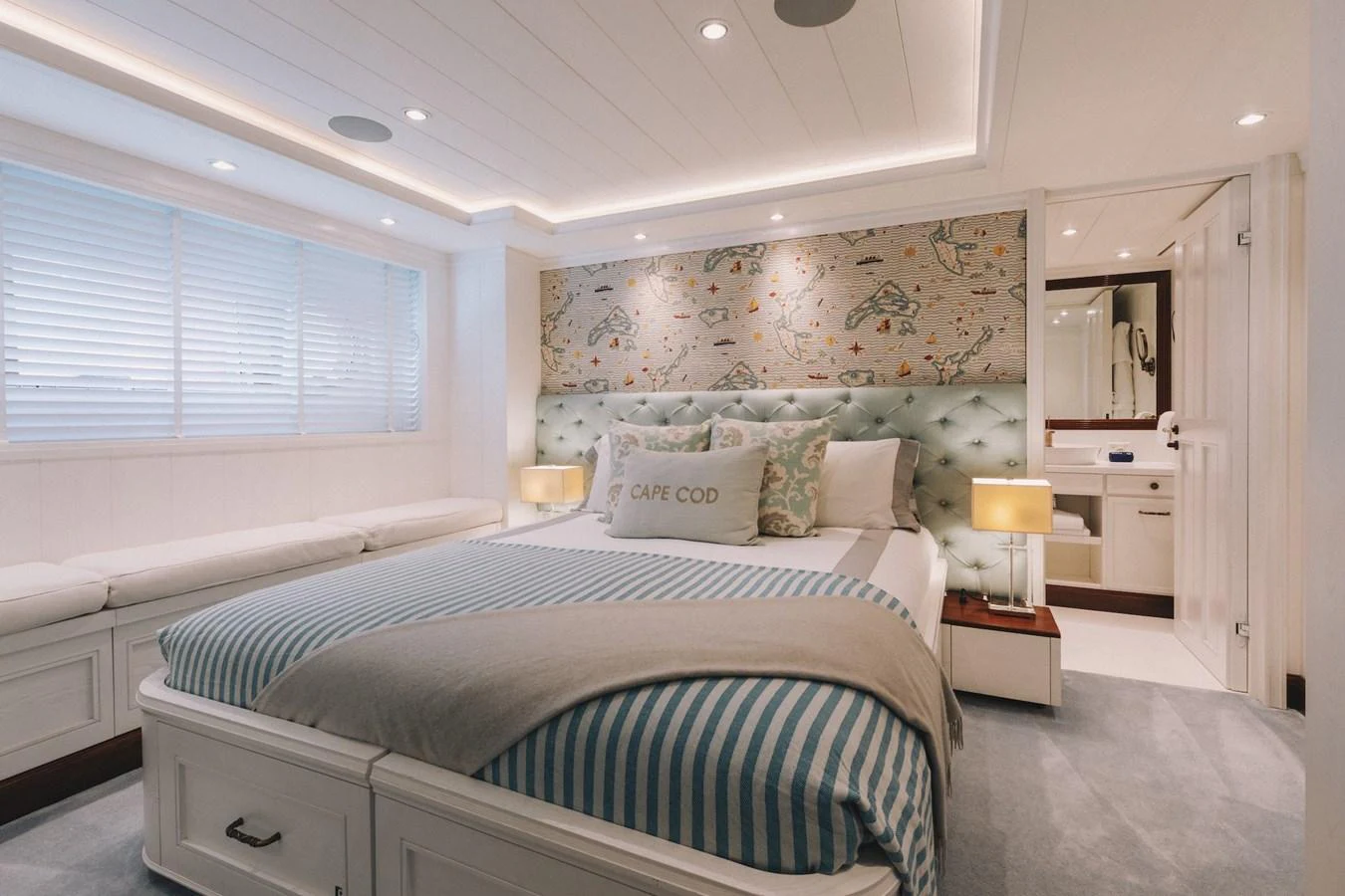A beautifully appointed stateroom with a plush bed and elegant decor. aboard LADY TRUDY Yacht for Sale