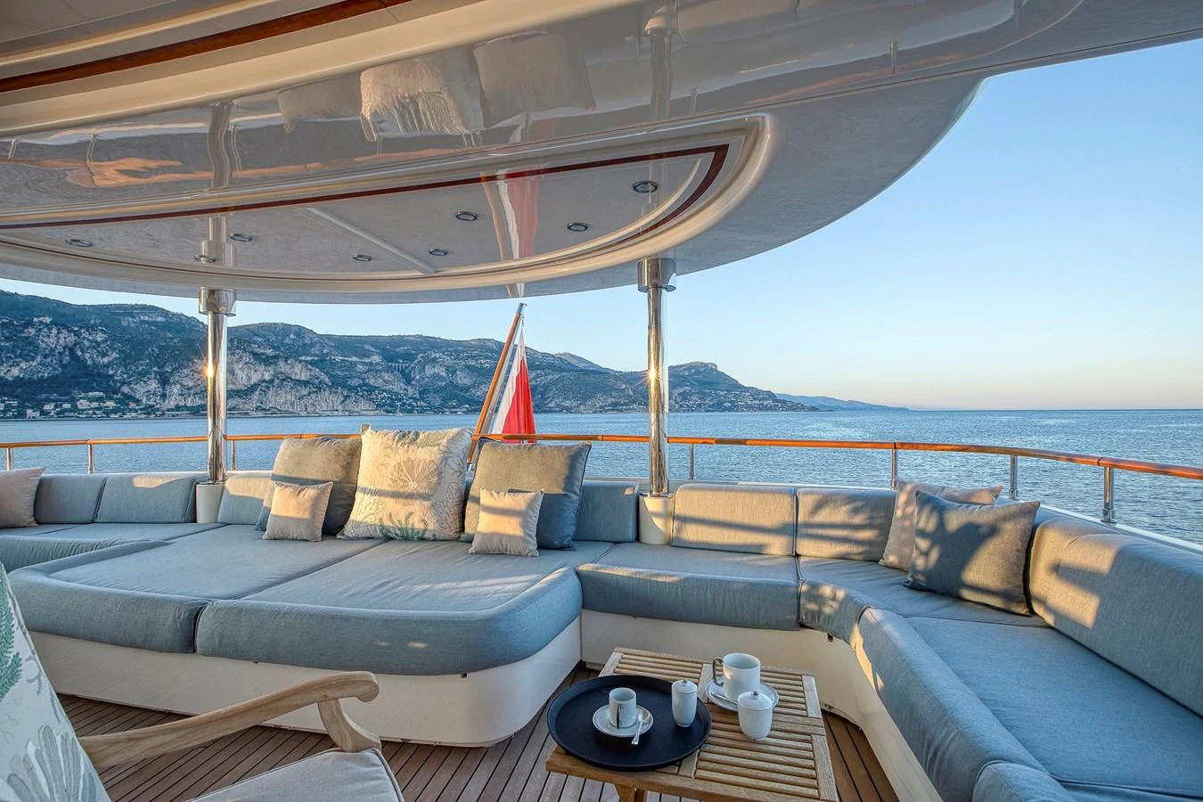 The aft deck features luxurious seating with stunning ocean views, perfect for relaxation. aboard LADY TRUDY Yacht for Sale