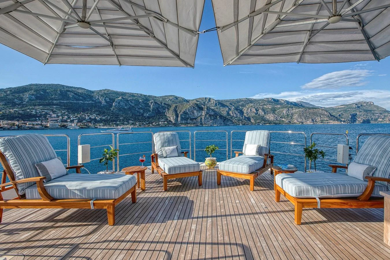 The sundeck offers a serene lounging area with comfortable seating and stunning ocean views. aboard LADY TRUDY Yacht for Sale