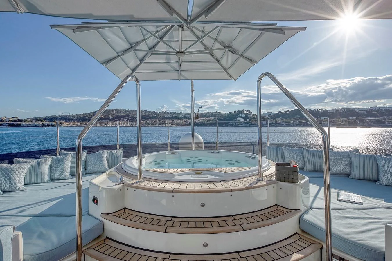 The sundeck features a luxurious jacuzzi surrounded by comfortable seating with stunning ocean views. aboard LADY TRUDY Yacht for Sale