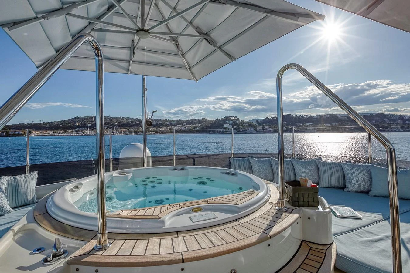 The sundeck features a luxurious hot tub with panoramic views of the surrounding waters. aboard LADY TRUDY Yacht for Sale