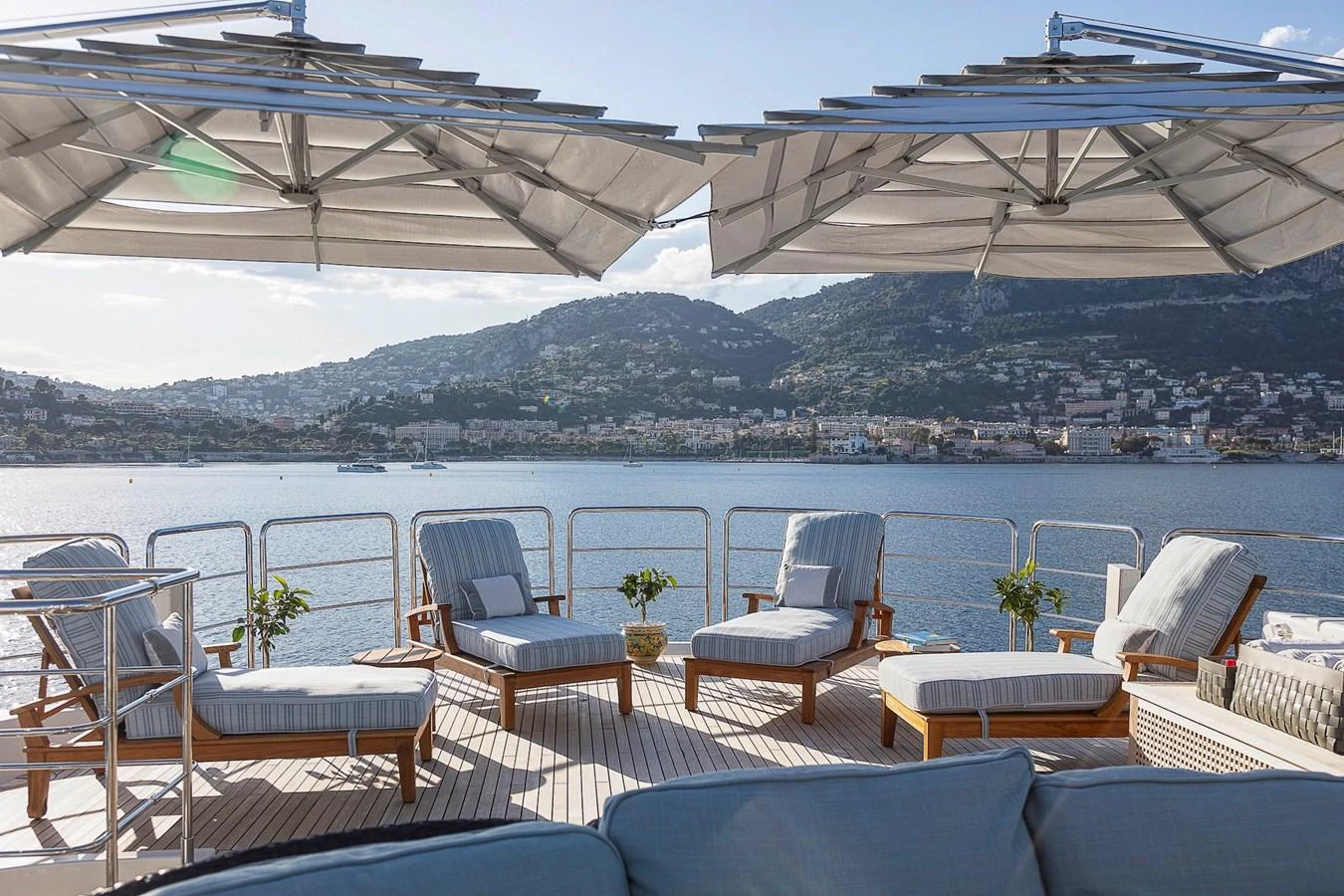 The sundeck offers a relaxing area with comfortable seating and shade under large umbrellas. aboard LADY TRUDY Yacht for Sale