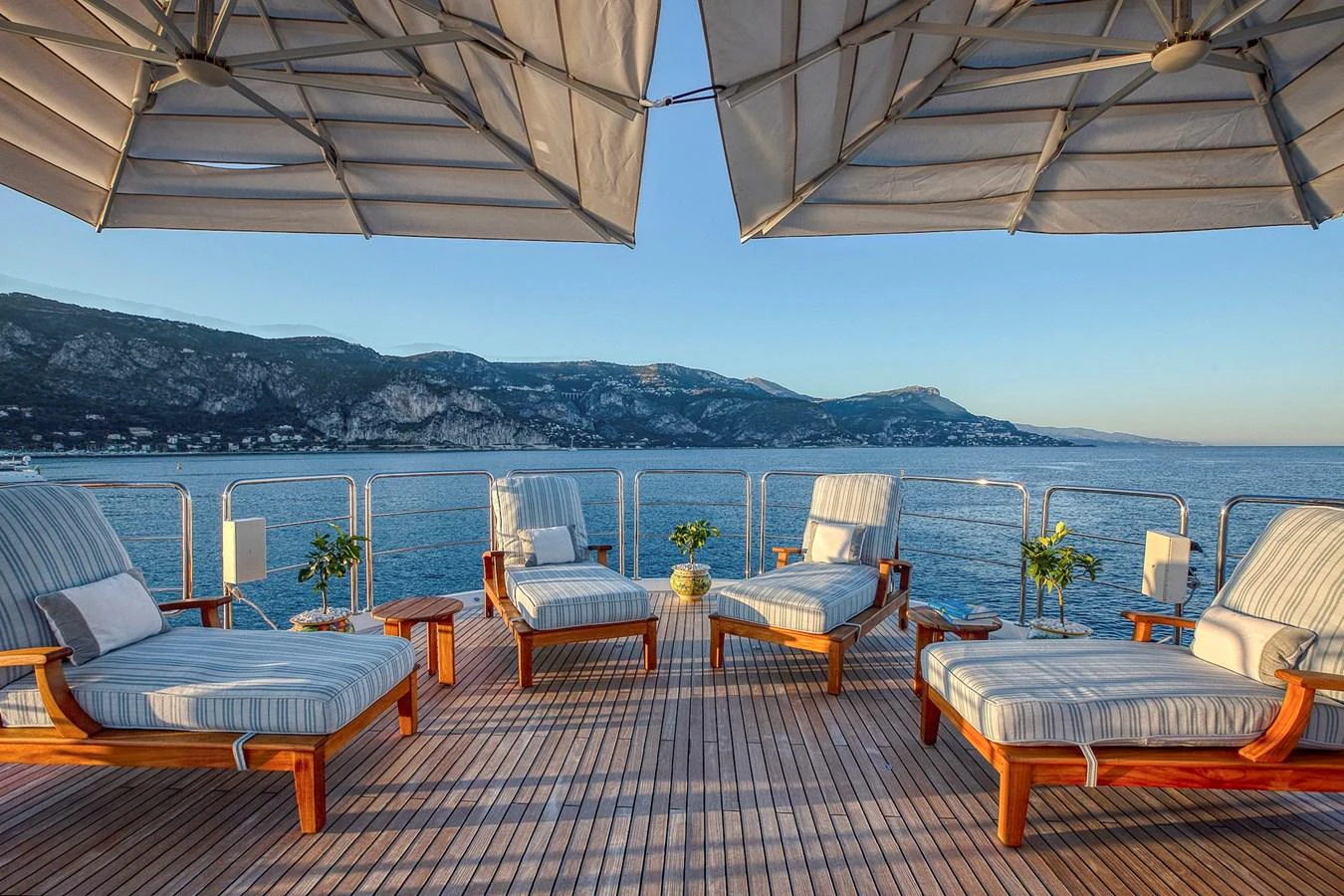 The sundeck offers a relaxing space with comfortable lounge chairs and stunning ocean views. aboard LADY TRUDY Yacht for Sale