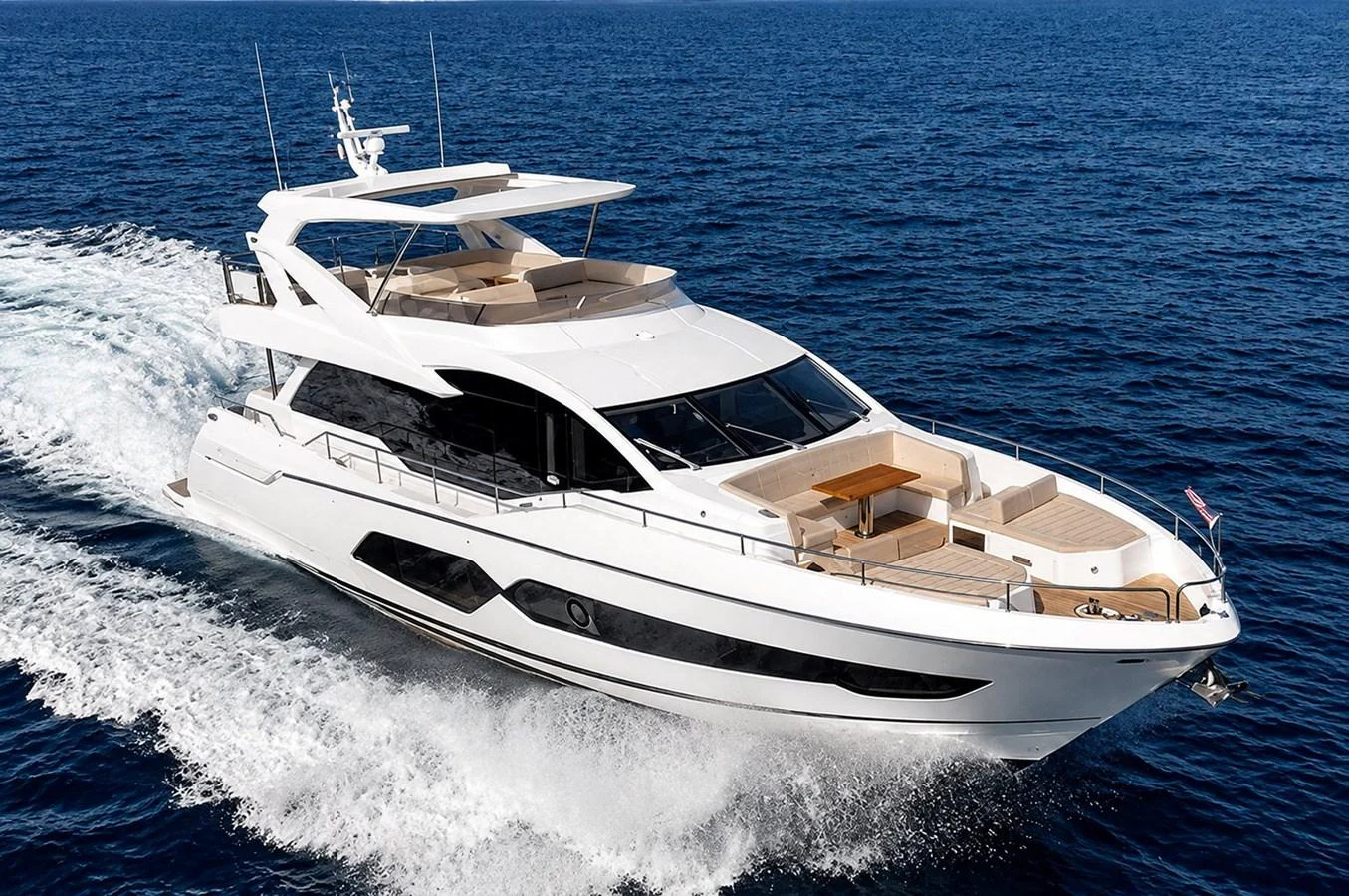 A sleek and modern yacht cruising on open water, showcasing its elegant design and spacious decks. aboard ANM Yacht for Sale
