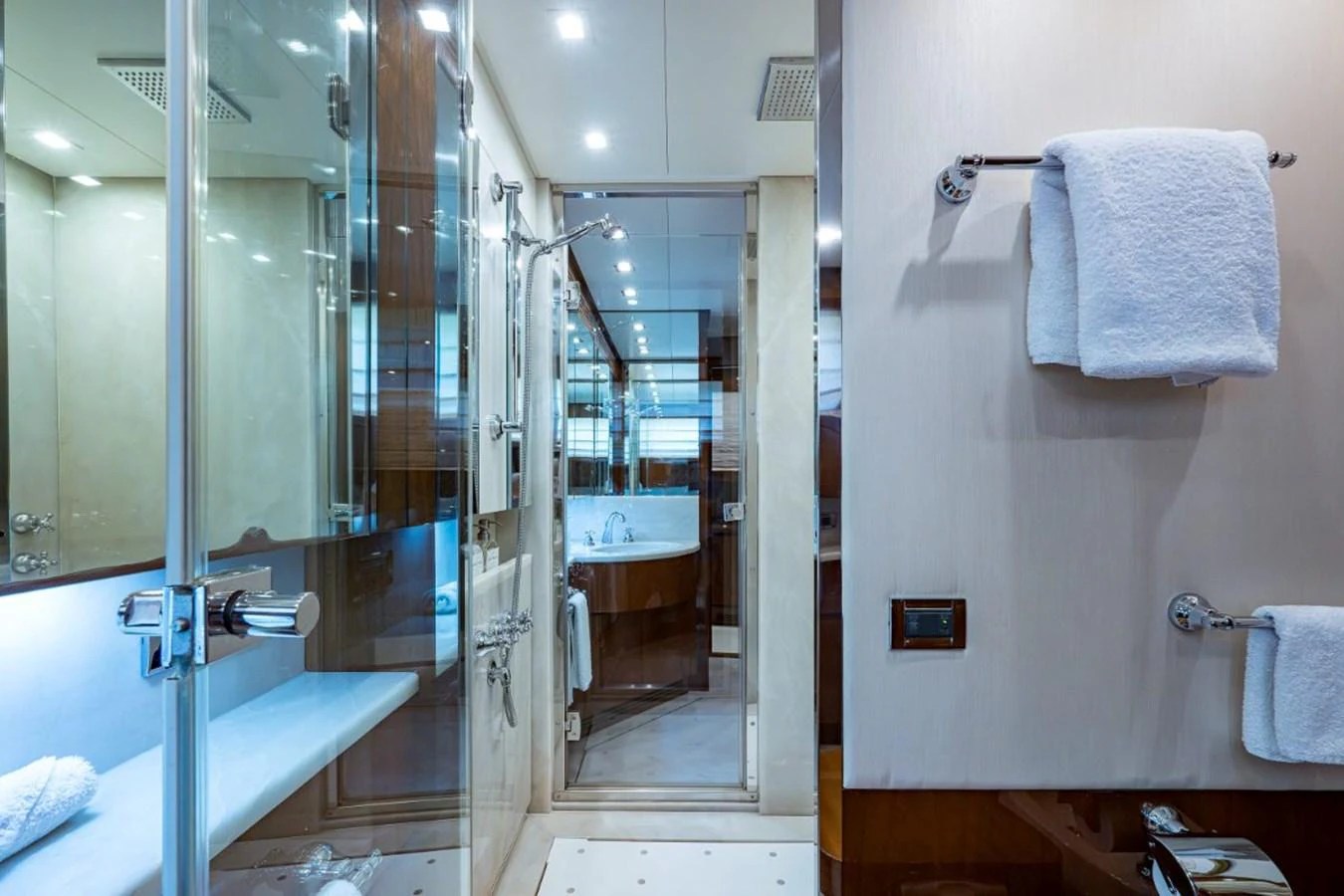 The yacht's bathroom features modern fixtures and a luxurious shower area. aboard ALEGHI Yacht for Sale