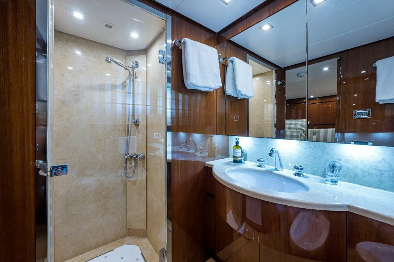 The yacht's bathroom features a sleek design with a spacious shower and elegant fixtures. aboard ALEGHI Yacht for Sale