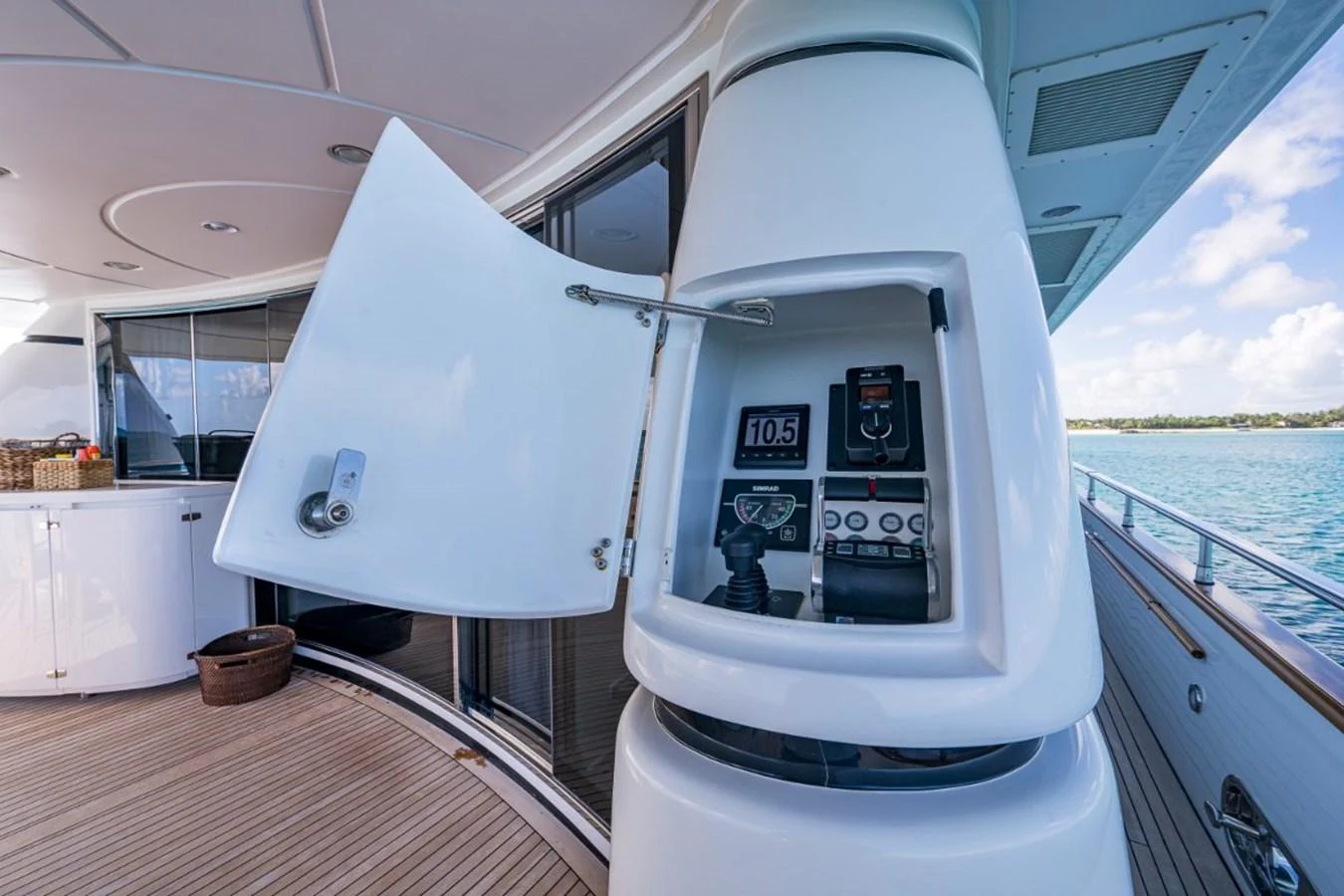 A detailed view of a yacht's control panel with a partially opened compartment on the deck. aboard ALEGHI Yacht for Sale