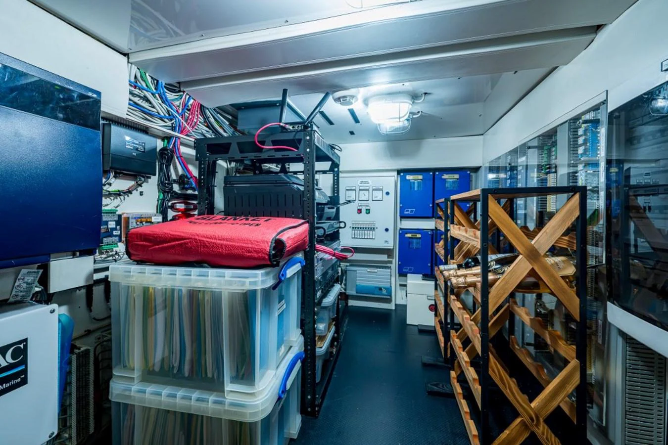 The engine room is equipped with advanced technical systems and organized storage solutions. aboard ALEGHI Yacht for Sale