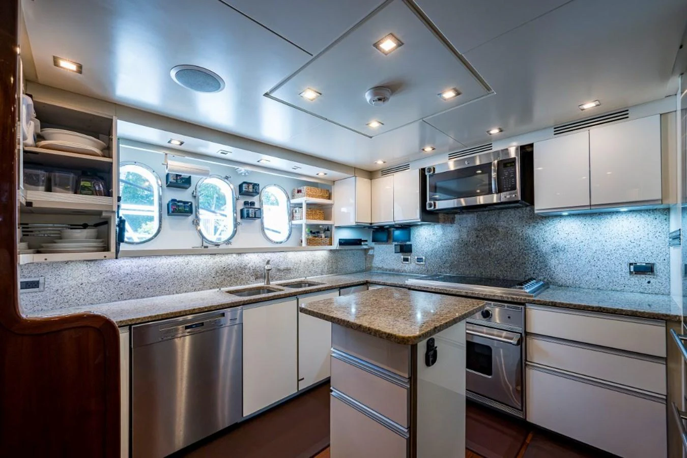 A modern and well-equipped galley with ample counter space and high-end appliances. aboard ALEGHI Yacht for Sale