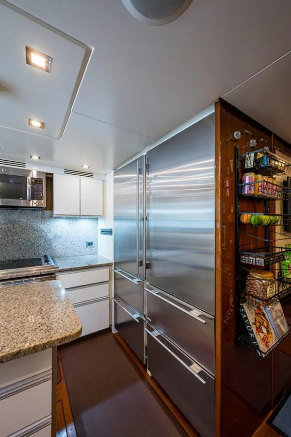 The galley features modern stainless steel appliances and ample storage space. aboard ALEGHI Yacht for Sale