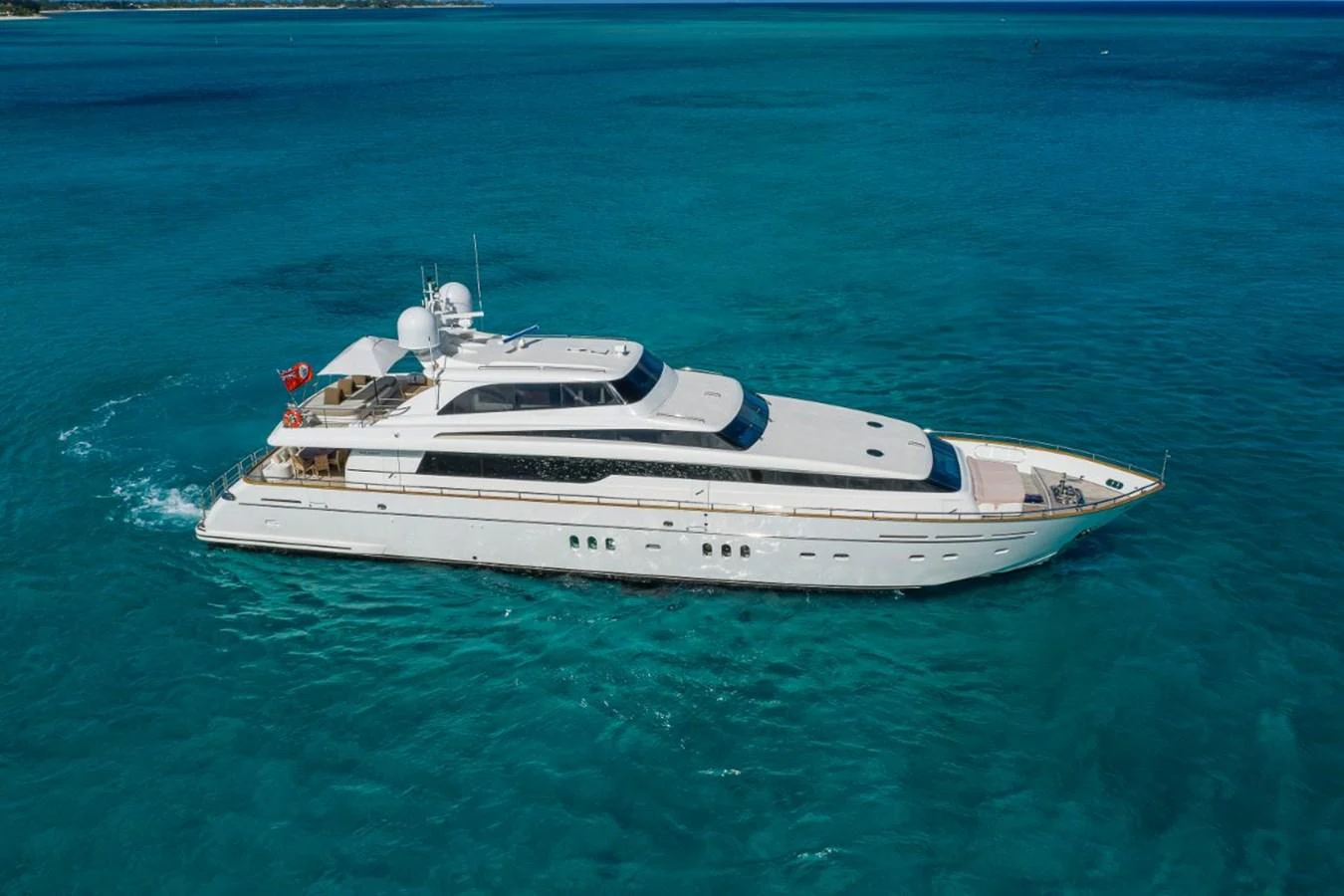 A sleek and elegant yacht cruising through clear blue waters. aboard ALEGHI Yacht for Sale