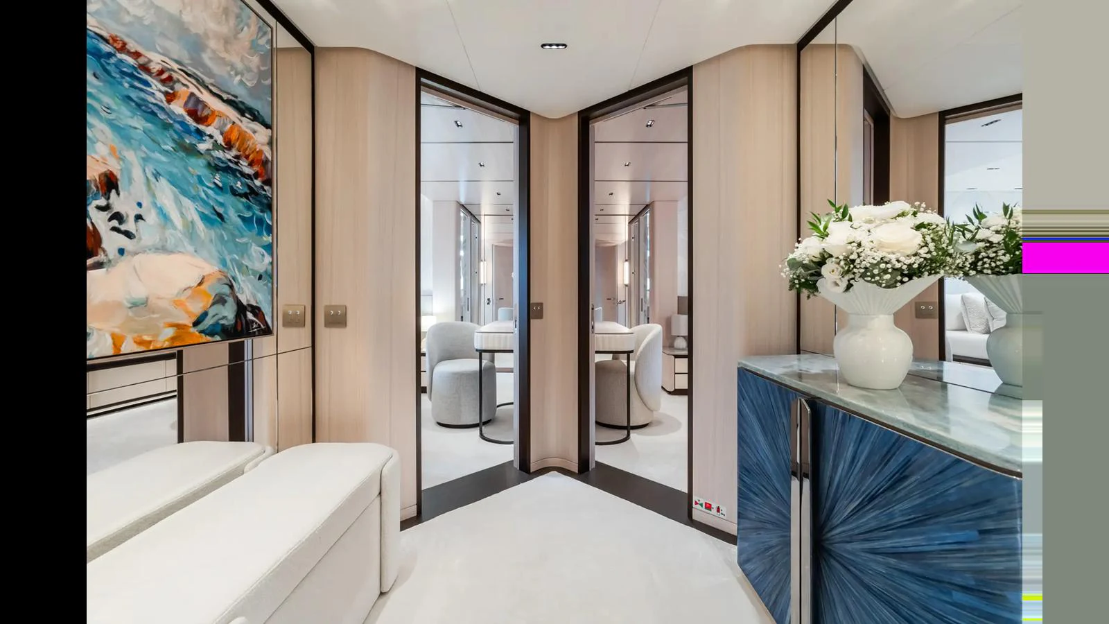 A luxurious yacht interior featuring elegant decor and modern furnishings. aboard BIG SHARK Yacht for Sale