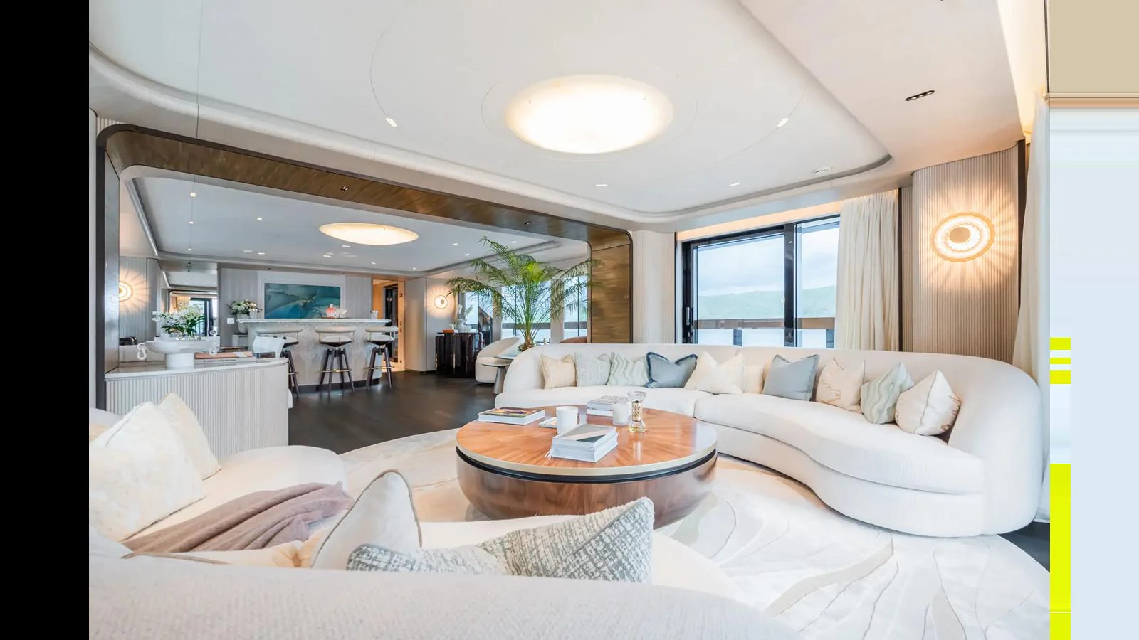 The yacht's salon features elegant seating and a modern, spacious design. aboard BIG SHARK Yacht for Sale