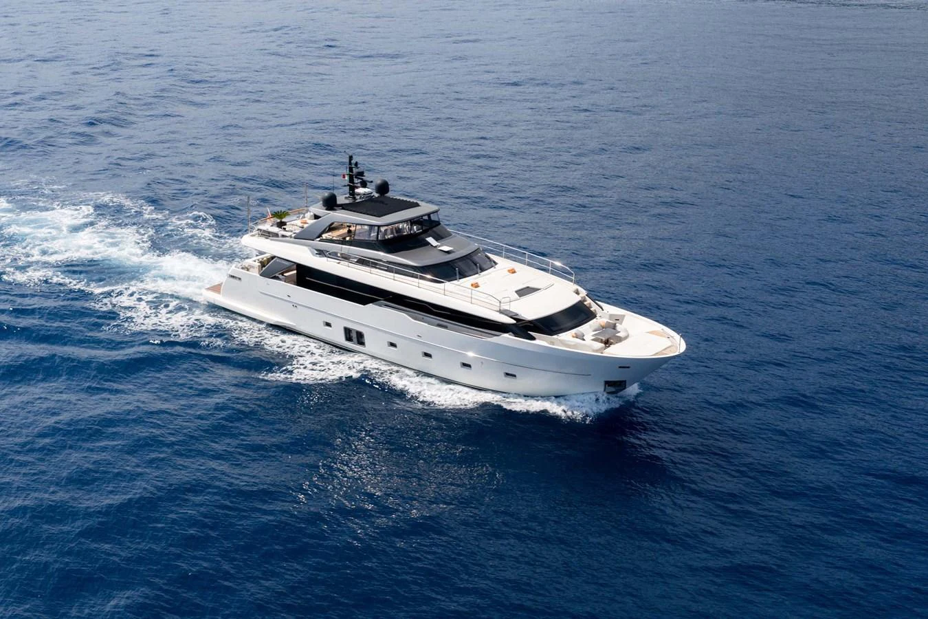 A sleek and modern yacht cruising through open waters. aboard JACKI 8 Yacht for Sale