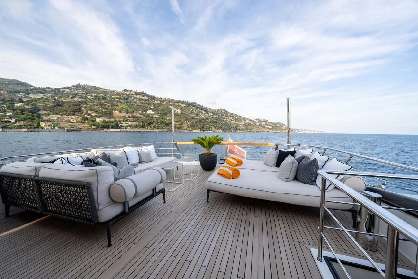 The aft deck offers a luxurious lounging area with plush seating and stunning sea views. aboard JACKI 8 Yacht for Sale
