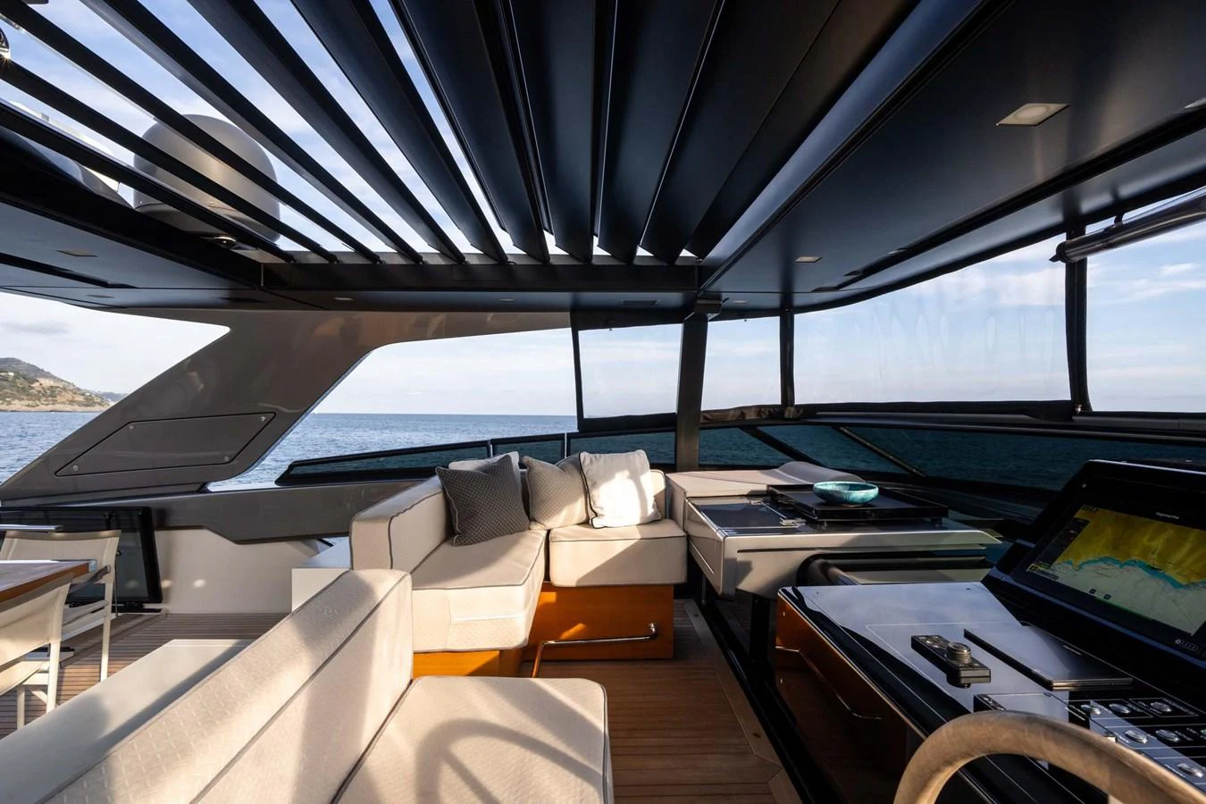The salon offers a spacious and modern seating area with panoramic views of the sea. aboard JACKI 8 Yacht for Sale