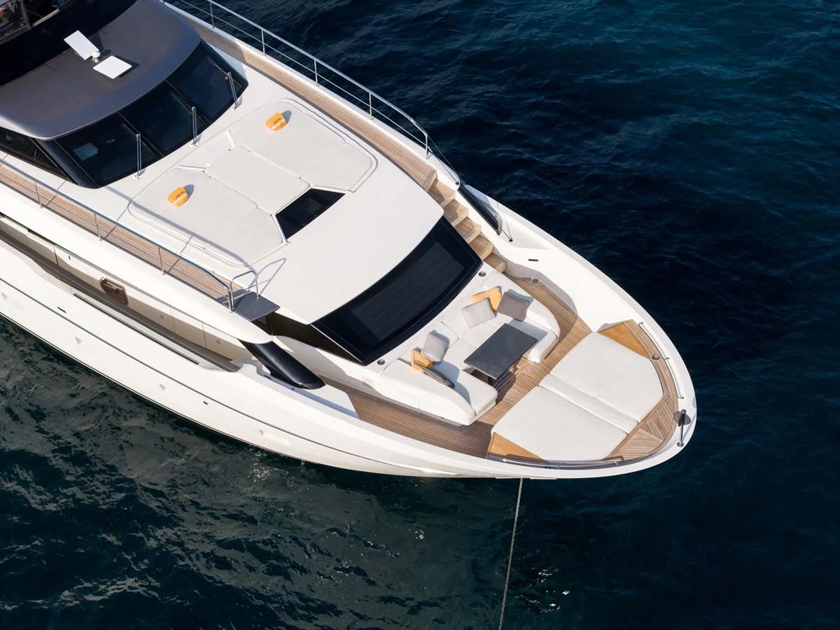 The foredeck of the yacht features luxurious sun pads and seating areas for relaxation. aboard JACKI 8 Yacht for Sale
