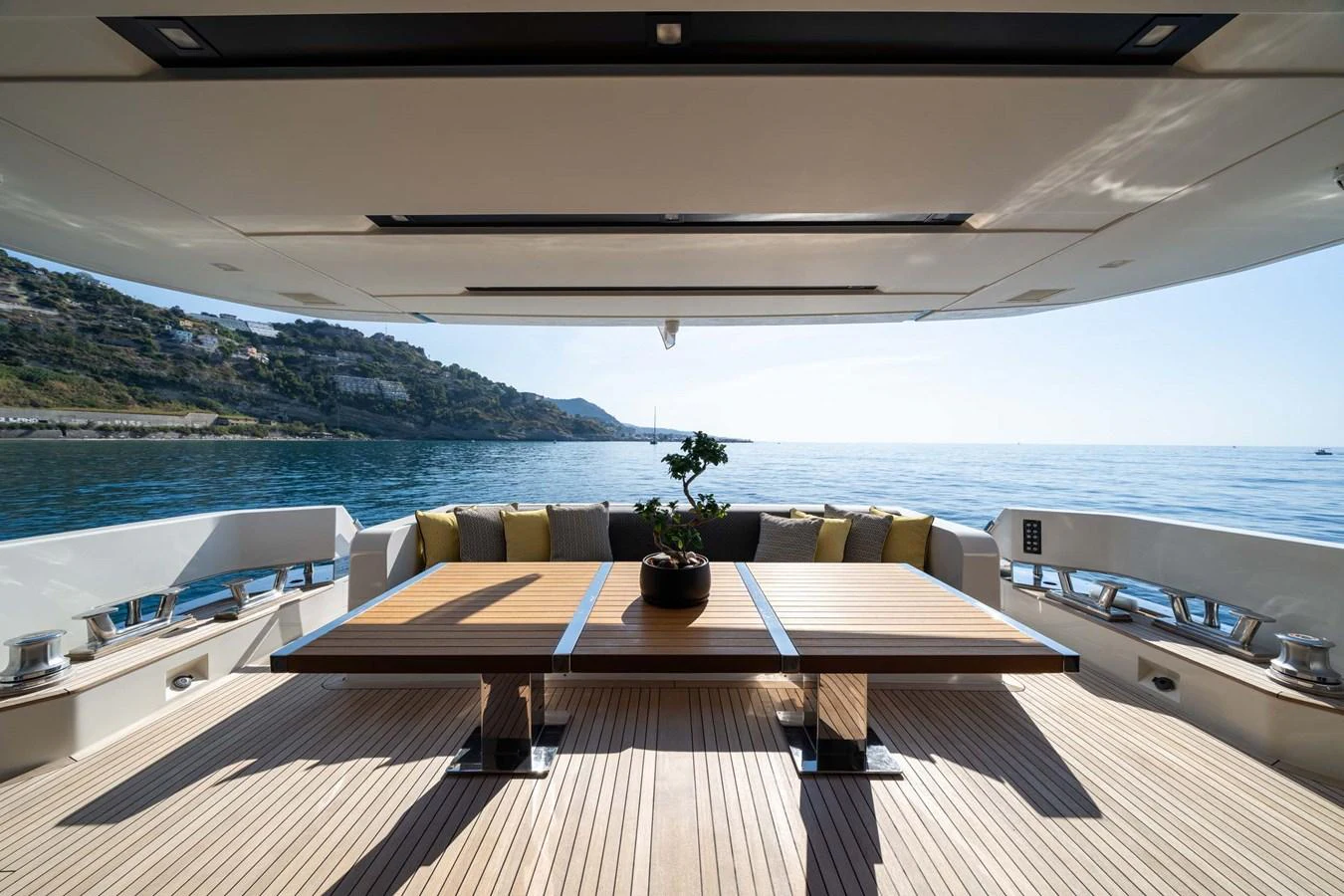The aft deck features a spacious dining area with stunning sea views. aboard JACKI 8 Yacht for Sale