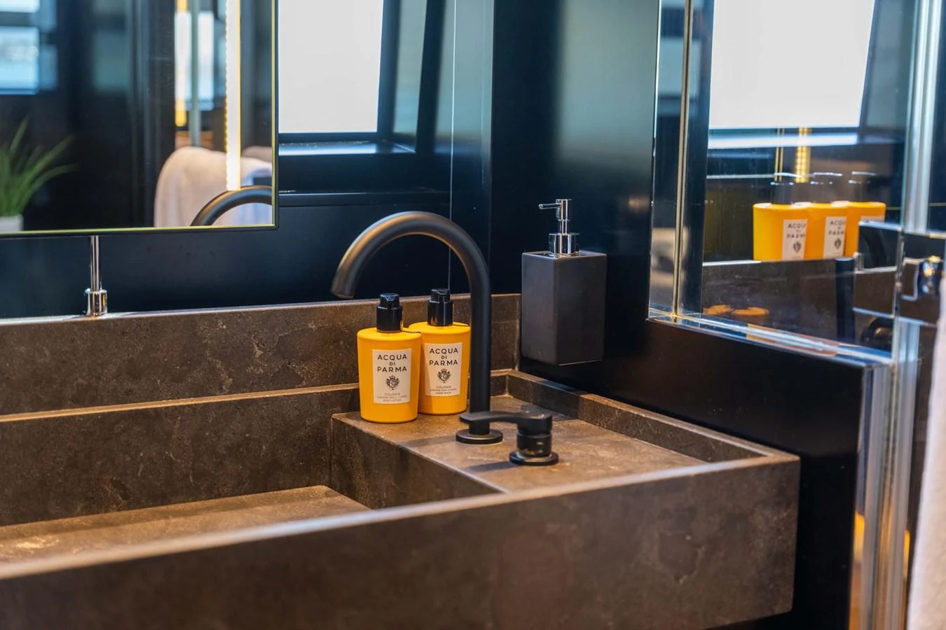 A sleek and modern bathroom with luxurious amenities and stylish fixtures. aboard JACKI 8 Yacht for Sale