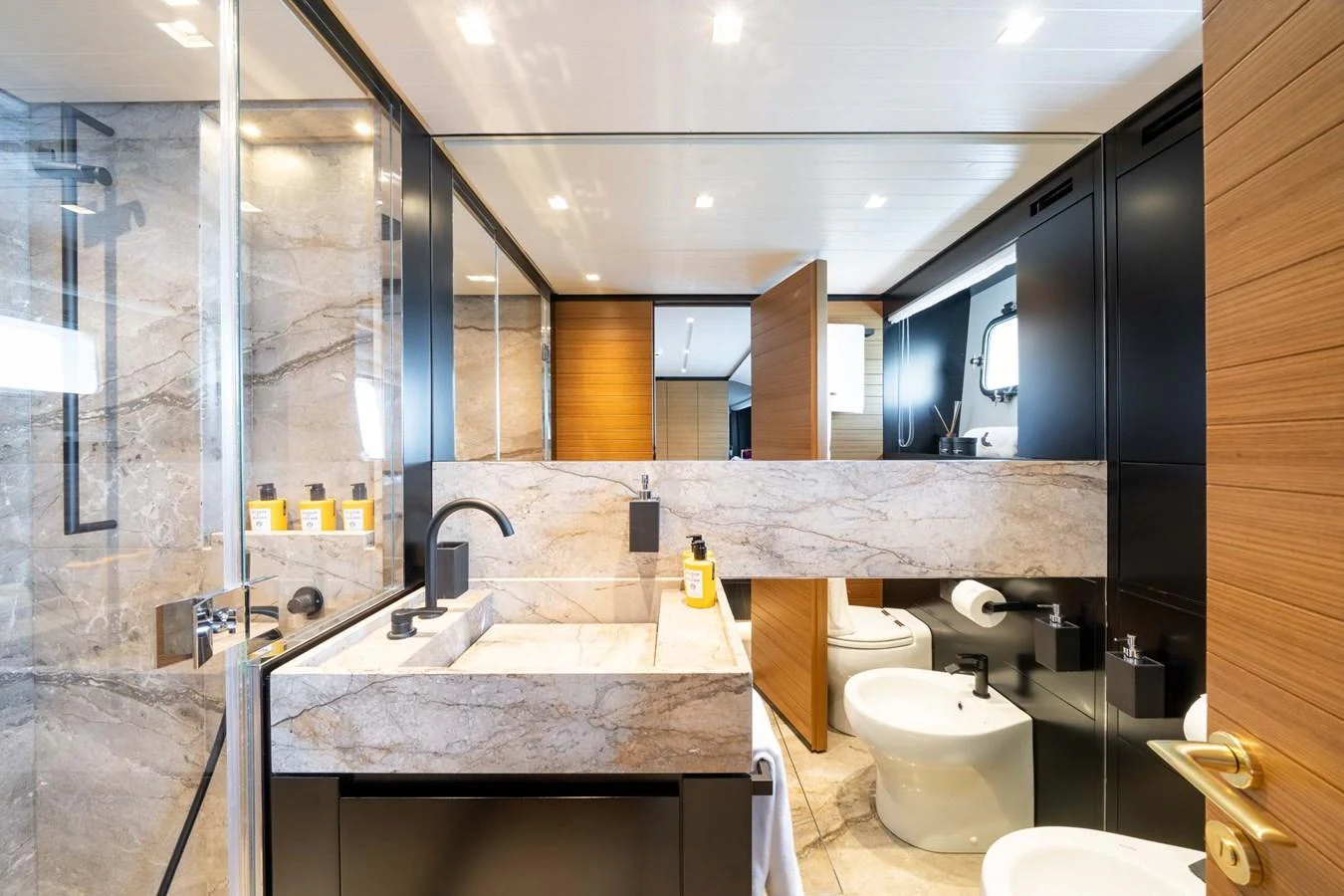 The yacht's bathroom features luxurious marble surfaces and modern fixtures. aboard JACKI 8 Yacht for Sale